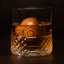 Ice Sphere sitting in a glass of whiskey